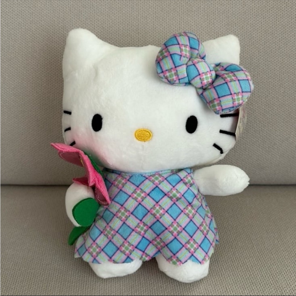 HELLO KITTY PLUSH HOLDING PINK
FLOWER NWT